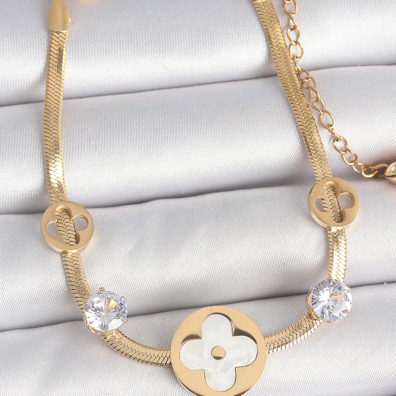 316L Çelik Gold Renk İtalyan Zincir Beyaz Mineli Yonca Model Zirkon Taş Detaylı Kadın Bileklik