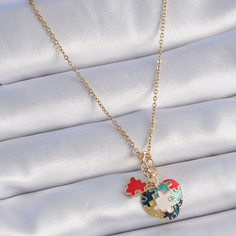 316L Çelik Gold Renk Yapboz Motif Kalp Figür Charm Model Kadın Kolye