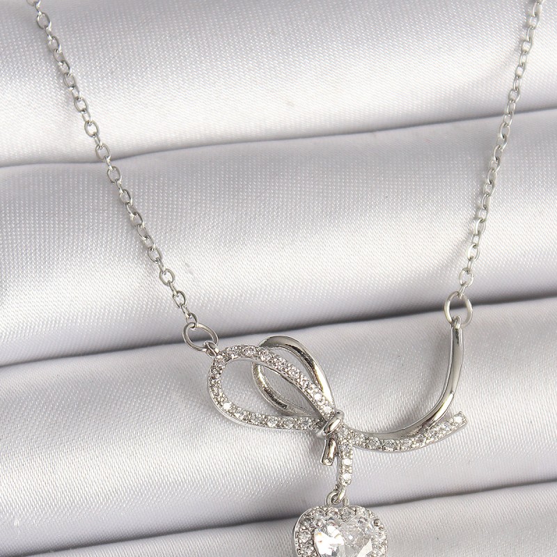 316L Çelik Gümüş Renk Zincir Zirkon Taşlı Düğüm Sallantı Kalp Figür Kadın Kolye