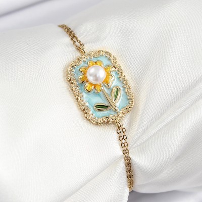 316L Çelik Zincir Turkuaz Mineli Sanatsal Portre İnci Detaylı Papatya Model Gold Renk Kadın Bileklik