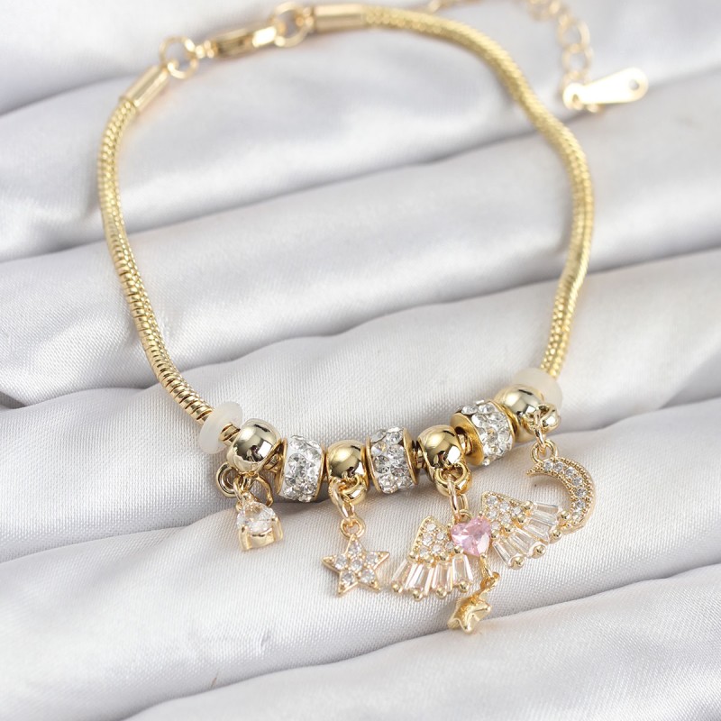 Pirinç Gold Renk Kanatlı Charmlı Kadın Bileklik