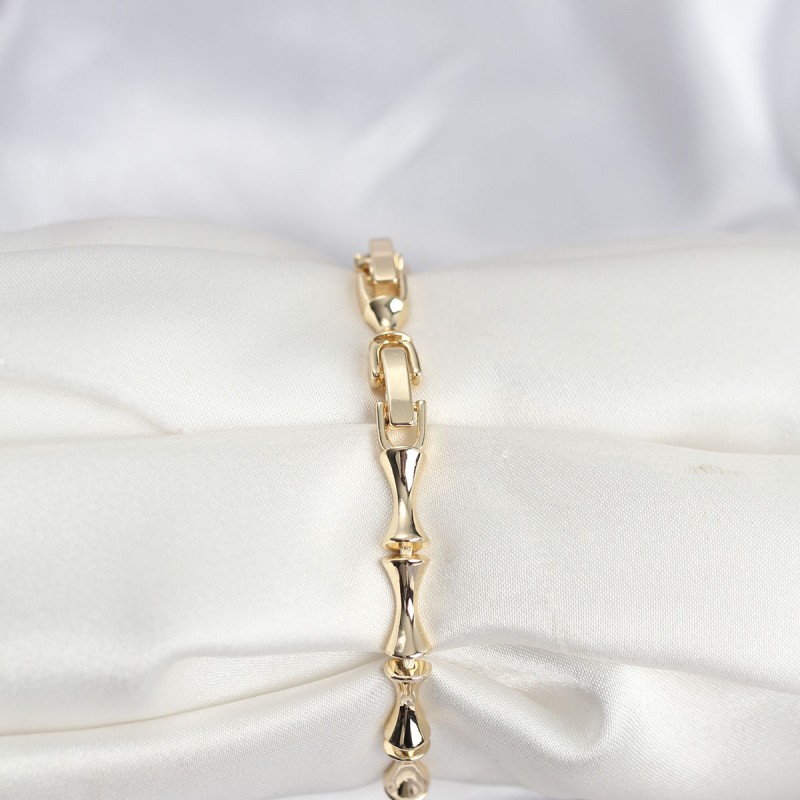 Pirinç Gold Renk VIP Seri Kemik Model Zirkon Taşlı Kadın Bileklik