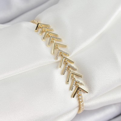 Pirinç Gold Renk Zirkon Taşlı Balık Sırtı Kadın Bileklik