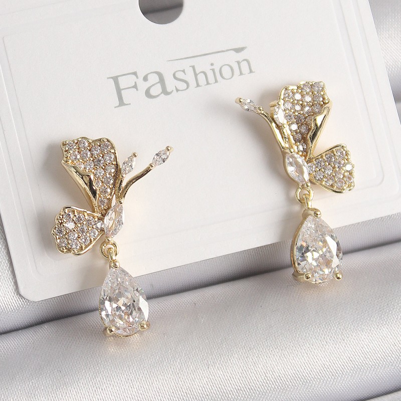 Pirinç Gold Renk Zirkon Taşlı Turna Kuşu Model Sallantı Detay Kadın Küpe