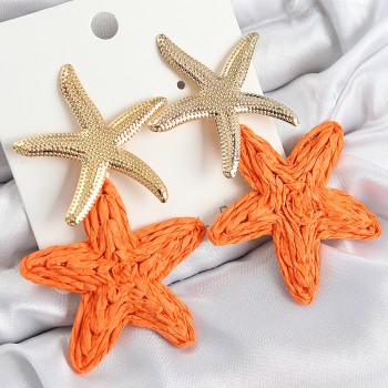 Pirinç Sallantılı Turuncu Deniz Yıldızı Model Gold Renk Hasır Küpe