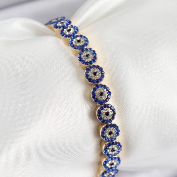 Pirinç Zirkon Taşlı Lacivert Nazar Model Gold Renk Lastikli Kadın Bileklik