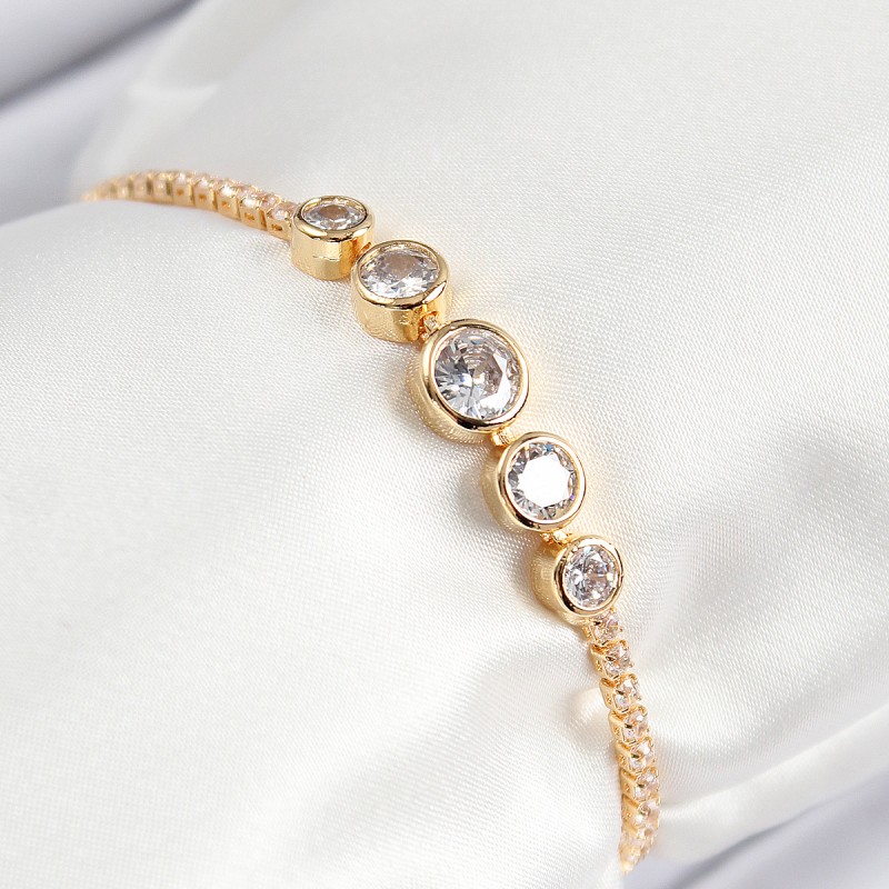 Pirinç Zirkon Taşlı Sıralı Daire Model Gold Renk Asansörlü Kadın Bileklik