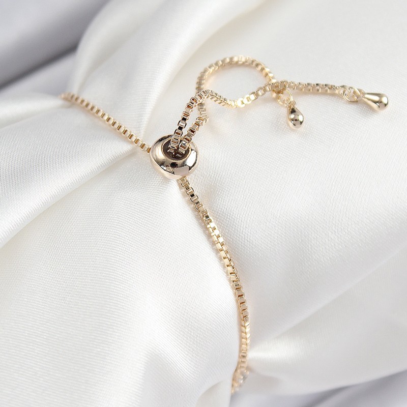 Pirinç Zirkon Taşlı Sıralı Ok Model Gold Renk Asansörlü Kadın Bileklik