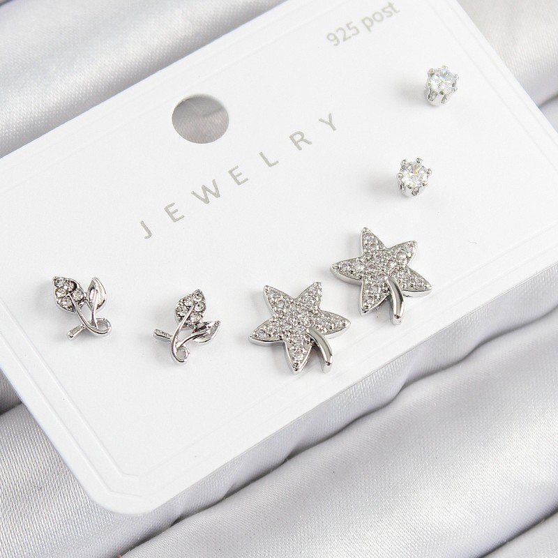 Pirinç Zirkon Taşlı Yıldız Ve Gül Model Gümüş Renk 925 Ayar Gümüş Çivi Kadın Küpe Set