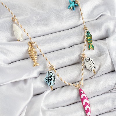 Seramik Motifli Pembe Balık Figürlü Model Krem İp Kadın Kolye